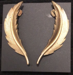 brinco pena earcuff FM